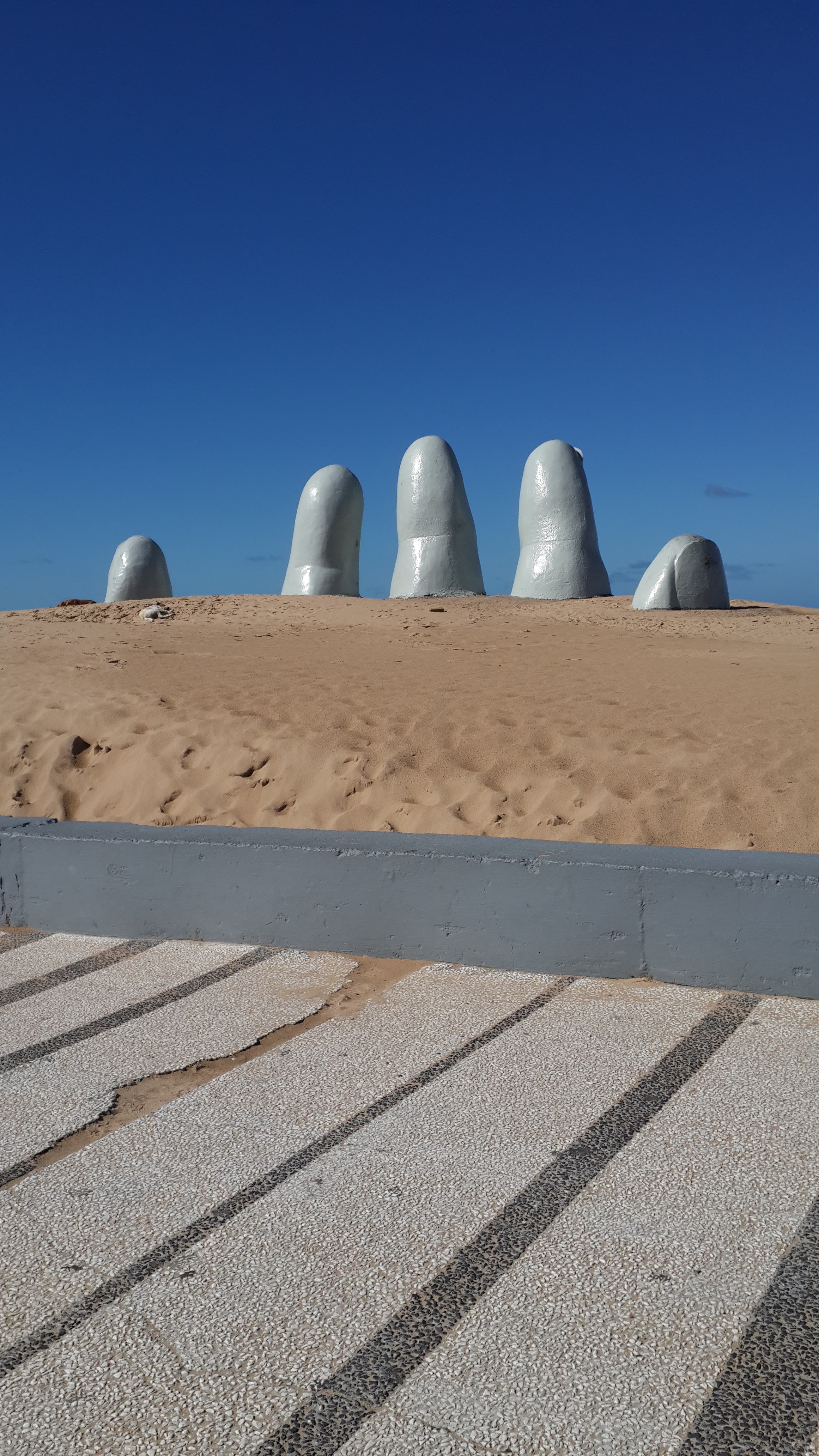 The Fingers of Punta del Este sculpture on Brava Beach